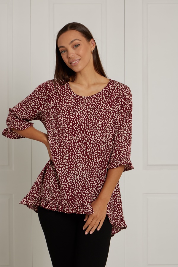 HIGH LOW RUFFLE HEM ANIMAL PRINT TOP HIGH LOW RUFFLE HEM ANIMAL PRINT TOP