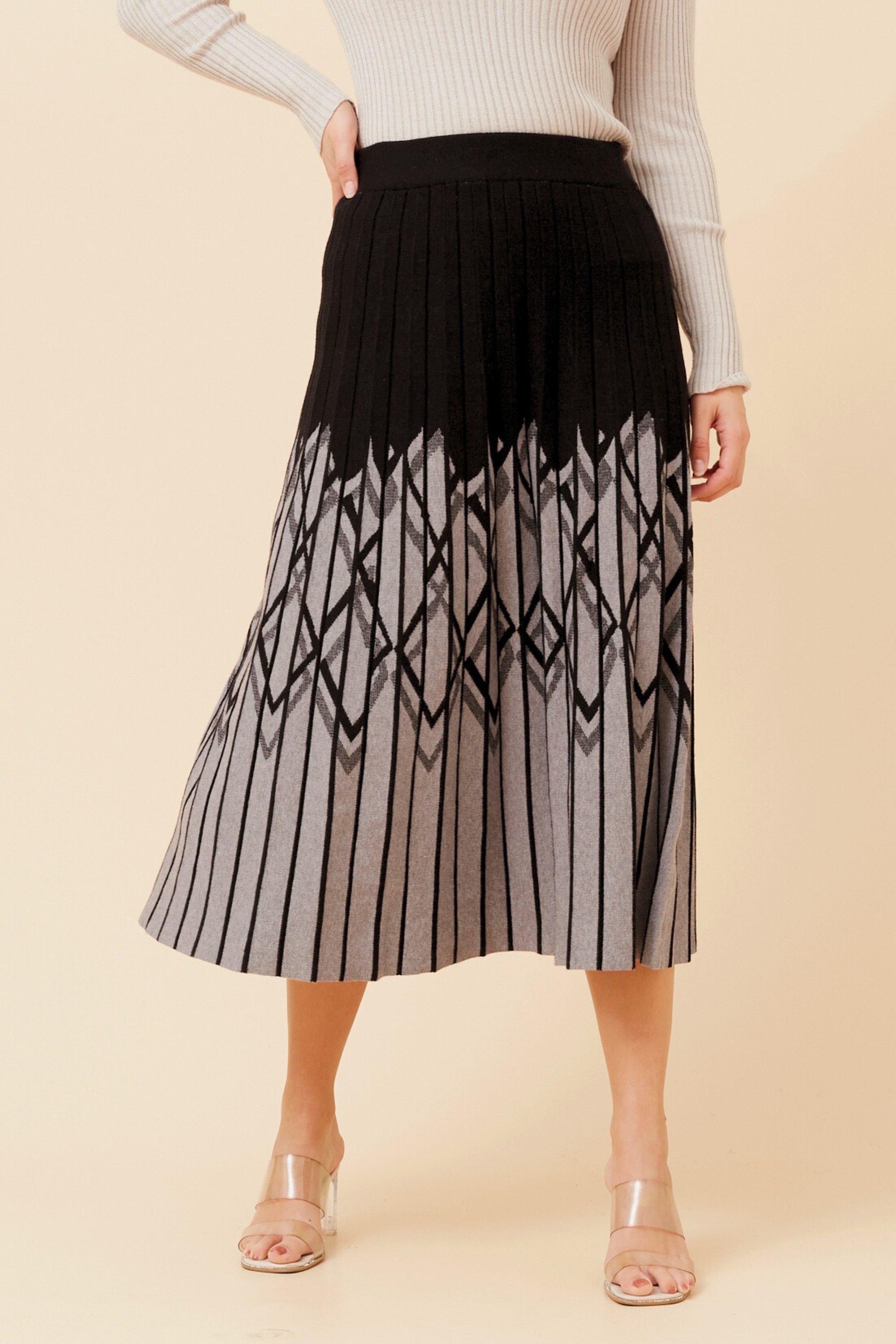 ISA PLEATED KNIT MIDI SKIRT