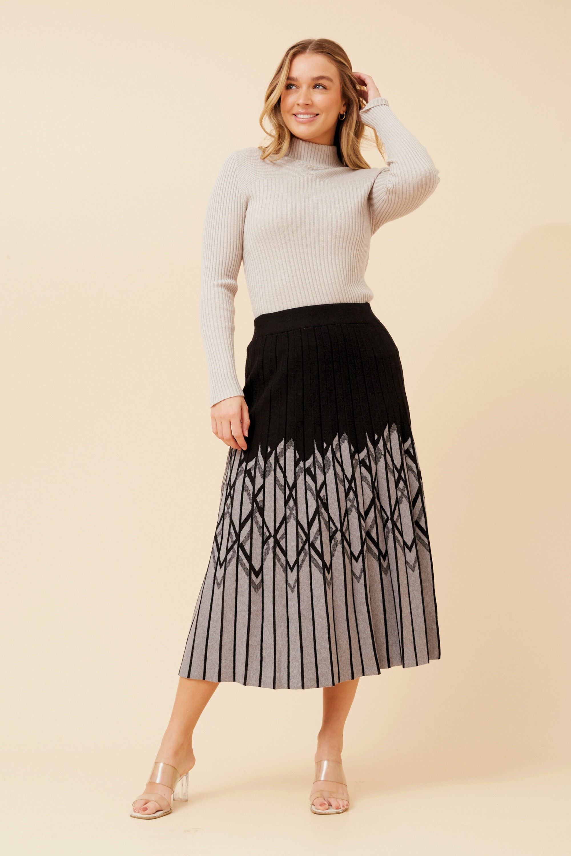 ISA PLEATED KNIT MIDI SKIRT